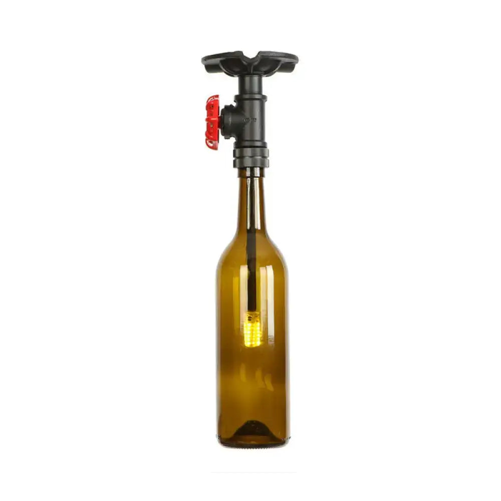 A rustic single light semi flushmount bottle design lamp featuring an amber glass bottle with a black valve handle
