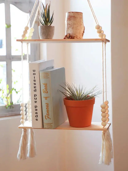 DecorBites™ rustic wooden wall shelf with natural rope, white beaded accents, and tassels for hanging plant storage