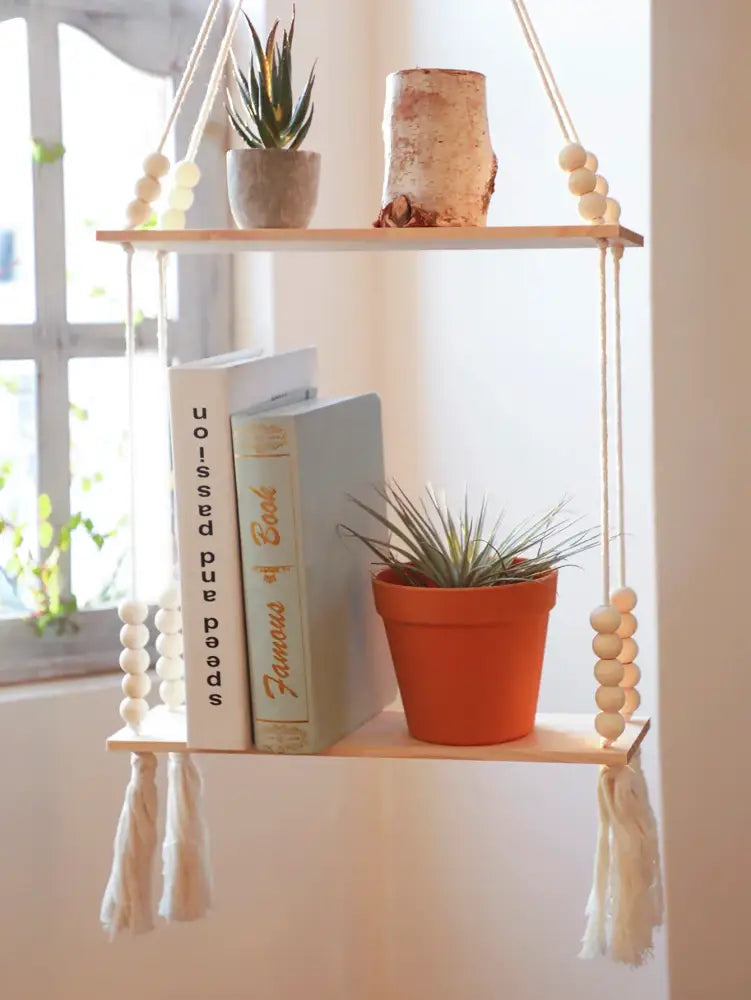 DecorBites™ rustic wooden wall shelf with natural rope, white beaded accents, and tassels for hanging plant storage