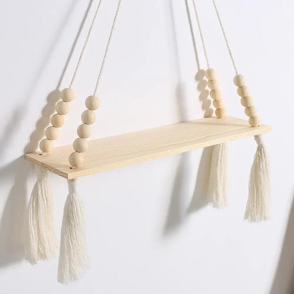 Decorbites rustic wooden wall shelf with minimalist hanging natural wood beads and cream tassels for plant storage