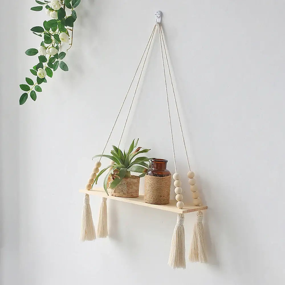DecorBites™ rustic wooden wall shelf with natural finish, cream macrame cords, tassels, and decorative wooden beads