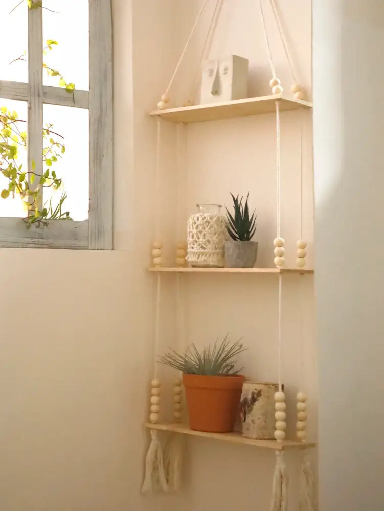 Decorbites rustic wooden wall shelf in light wood with macrame cords and wooden beads for hanging plant storage