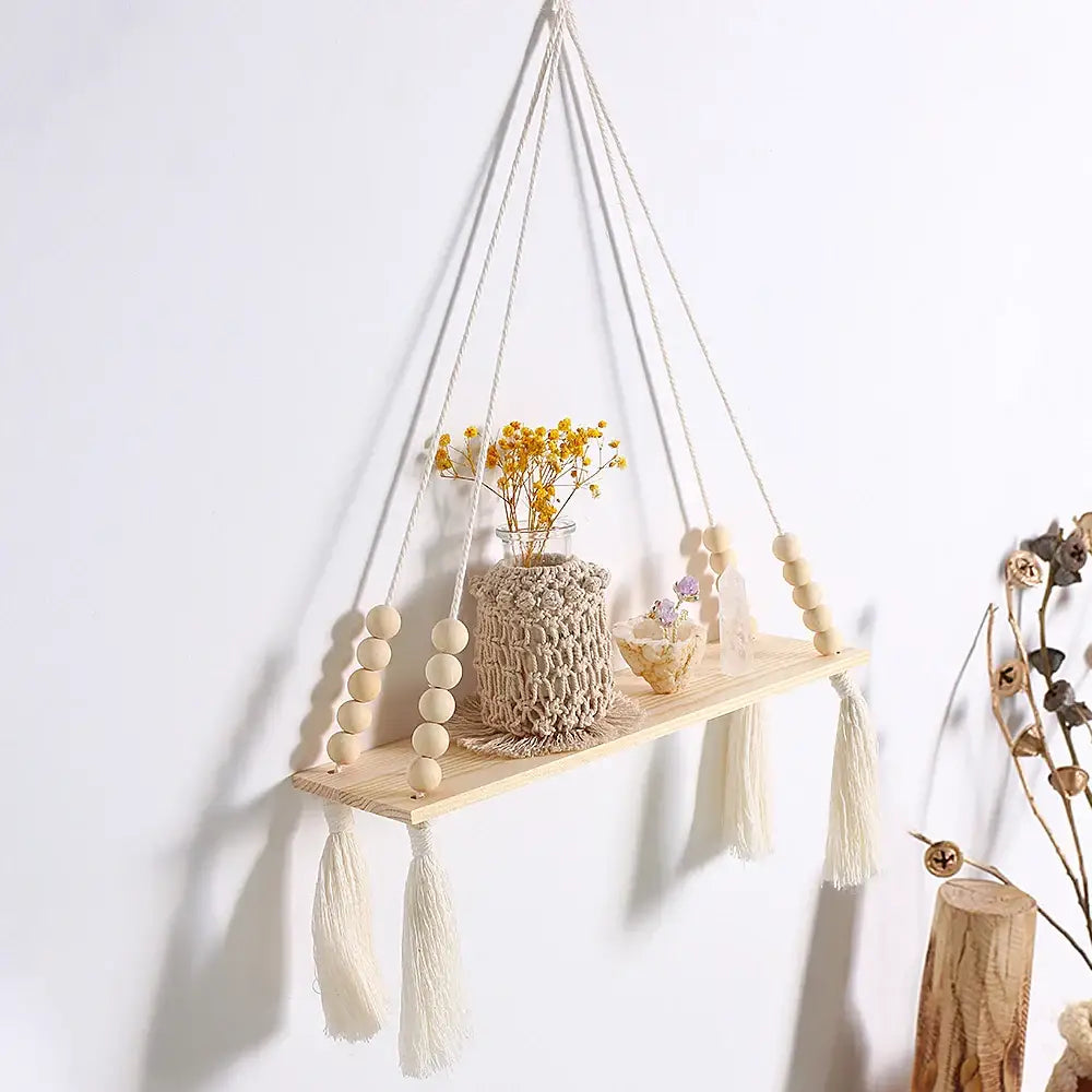 DecorBites™ rustic wooden wall shelf in light wood with macrame cords wooden beads and tassels for hanging plant storage