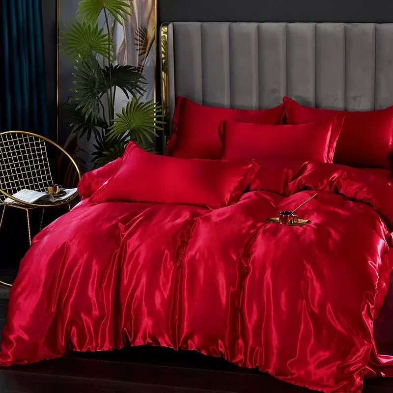 Decorbites satin silk bedding set in vibrant red with glossy finish includes duvet cover and matching pillows for width bed