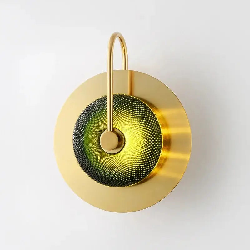Decorbites™ scandinavian brass wall sconce with a gold-toned circular frame and textured gradient green and black disc premium brass wall sconce