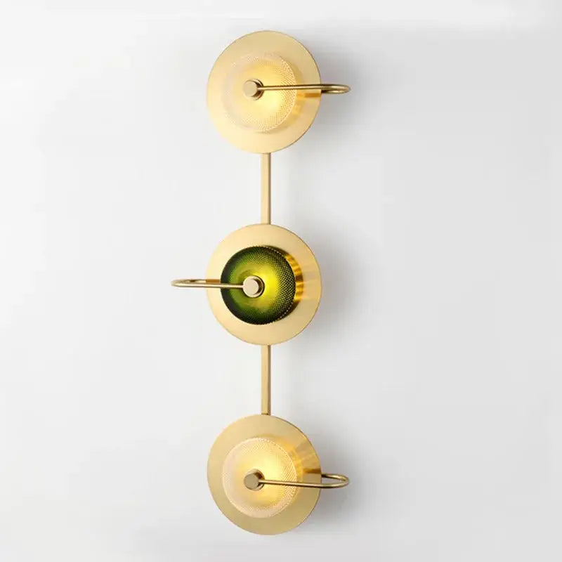 Decorbites™ scandinavian brass wall sconce with premium brass finish, three stacked circular shades, and green textured glass element