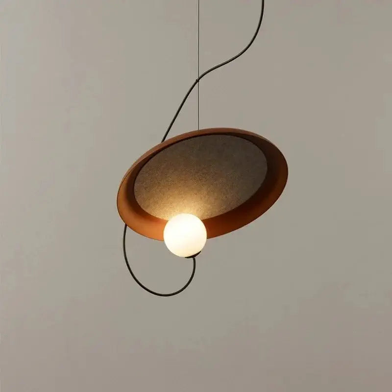 DecorBites™ Scandinavian pendant light with warm-toned oval metal frame and frosted glass shade housing a spherical bulb