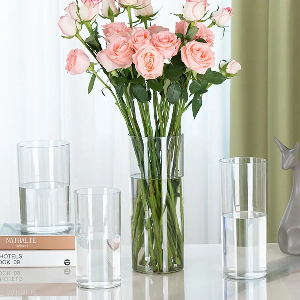 DecorBites™ shatterproof tall transparent acrylic flower vase holding a bouquet of pink roses in clear design
