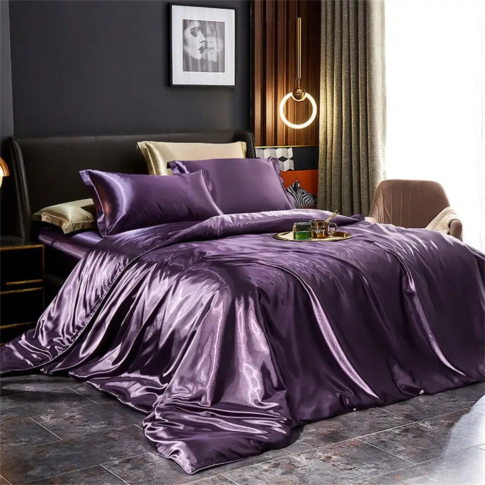Decorbites™ silk bedding set featuring lustrous purple satin duvet cover and matching pillows for width bed use