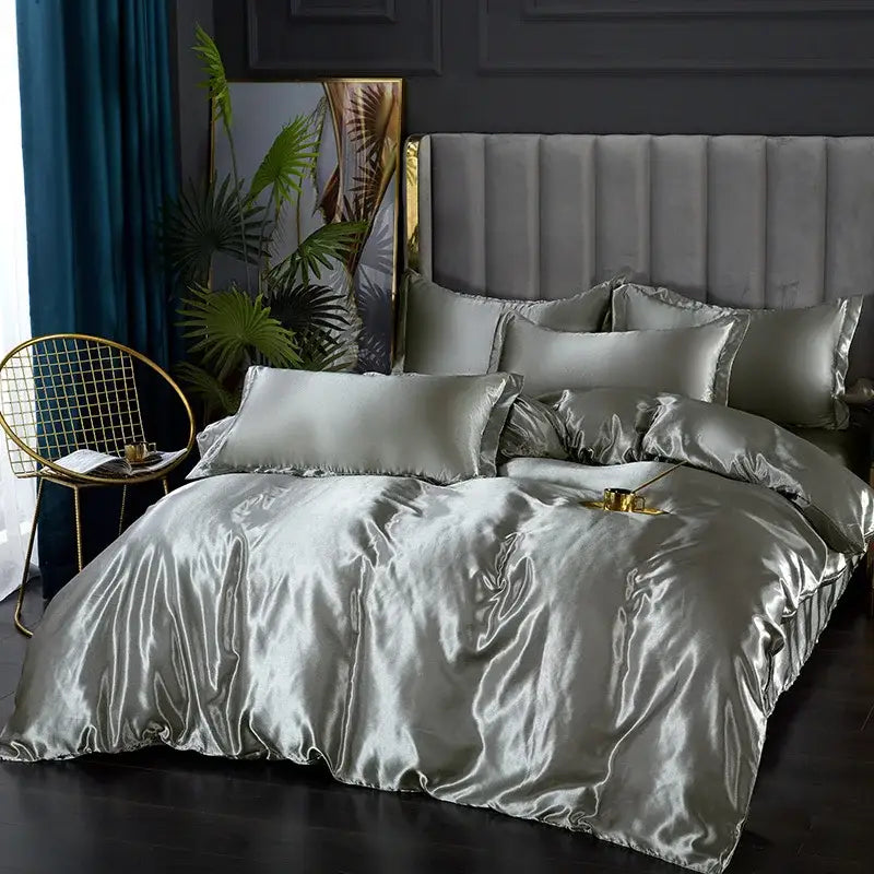 DecorBites™ silk satin duvet cover set in sleek silver with matching pillows features a luxurious sheen for width bed