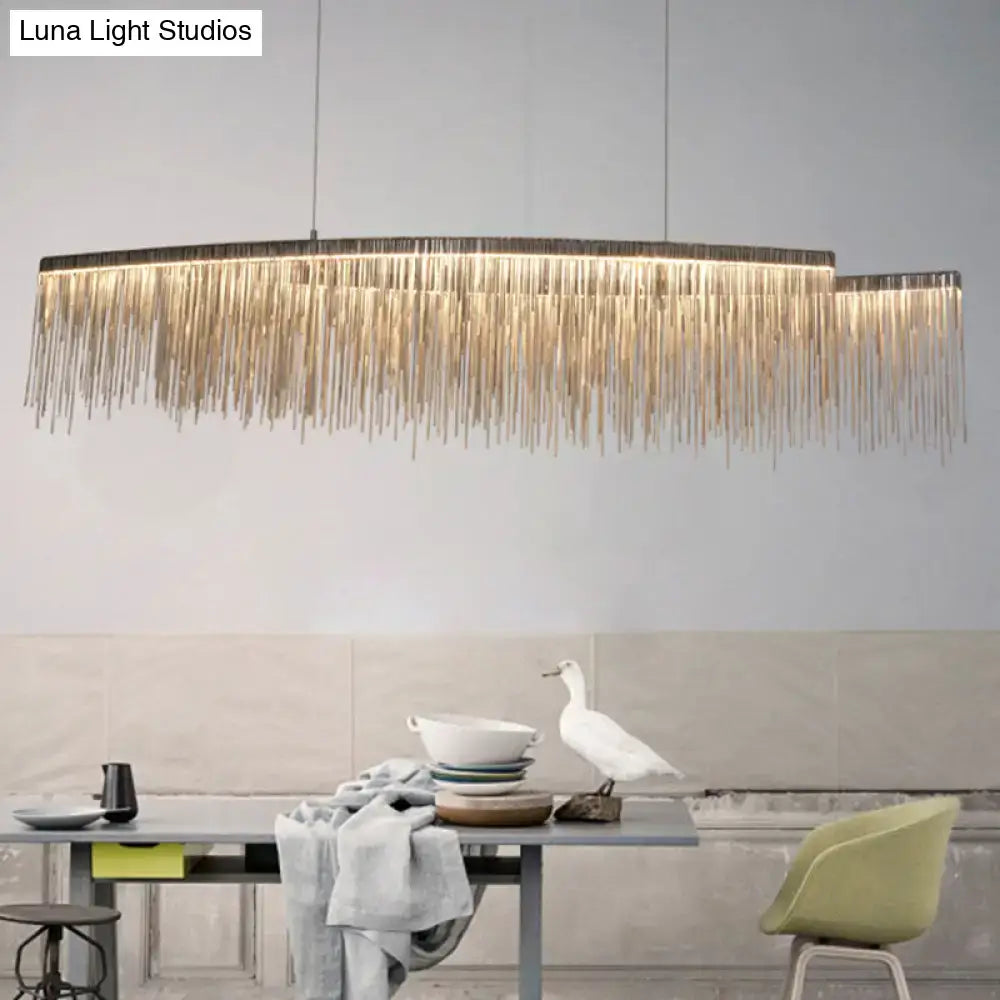 Modern gold-toned metallic tassel chain led pendant light with cascading fringe design for post-modern dining rooms