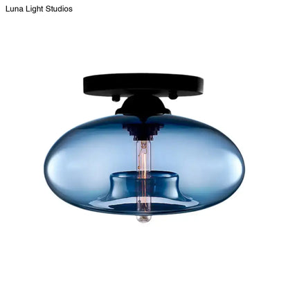 Blue glass oval flush mount pendant light with black metal ceiling mount from decorbites simple style collection