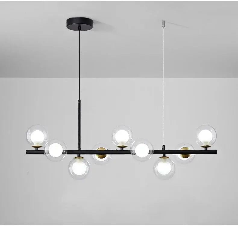 DecorBites sleek glass ball chandelier with black metal frame clear glass globe bulbs and gold-toned accents for dining room
