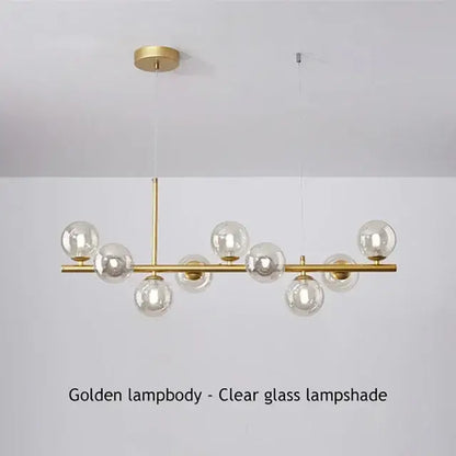 Decorbites sleek glass ball chandelier with golden brass frame and clear glass globe shades for dining room lighting