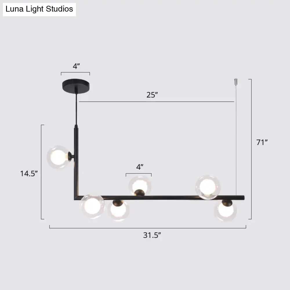 Decorbites sleek black metal pendant light with five clear glass globes for dining room hanging island design