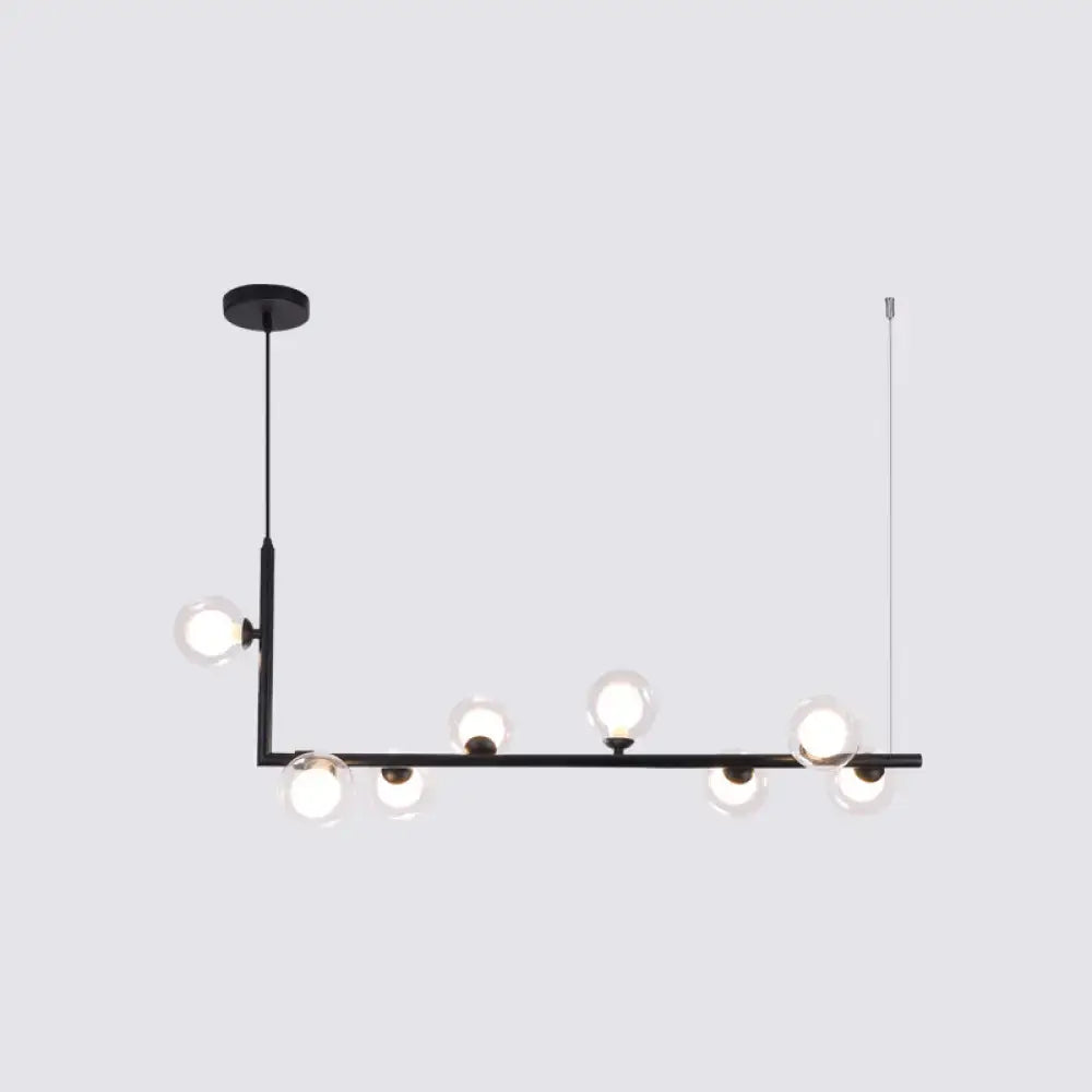DecorBites sleek black metal pendant light with six clear glass globes for dining room hanging island design