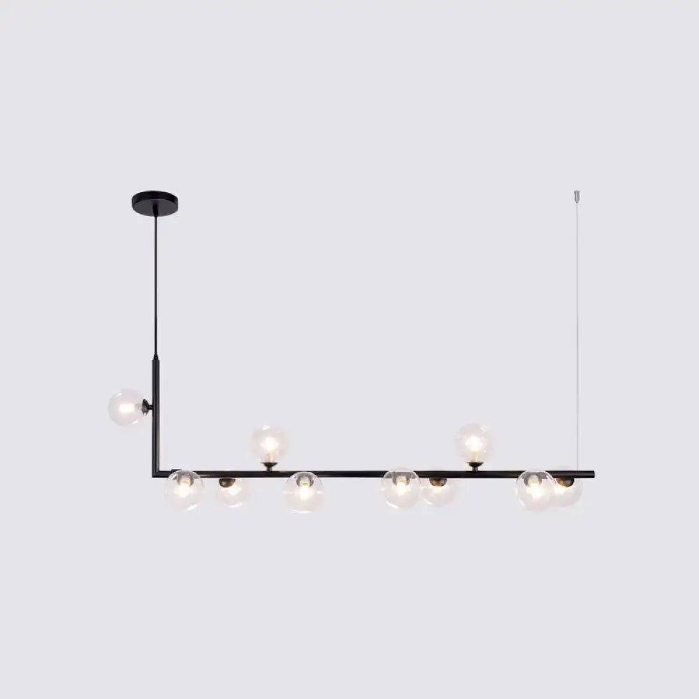 Modern black metal pendant light with clear glass globe bulbs for dining room hanging island by DecorBites™