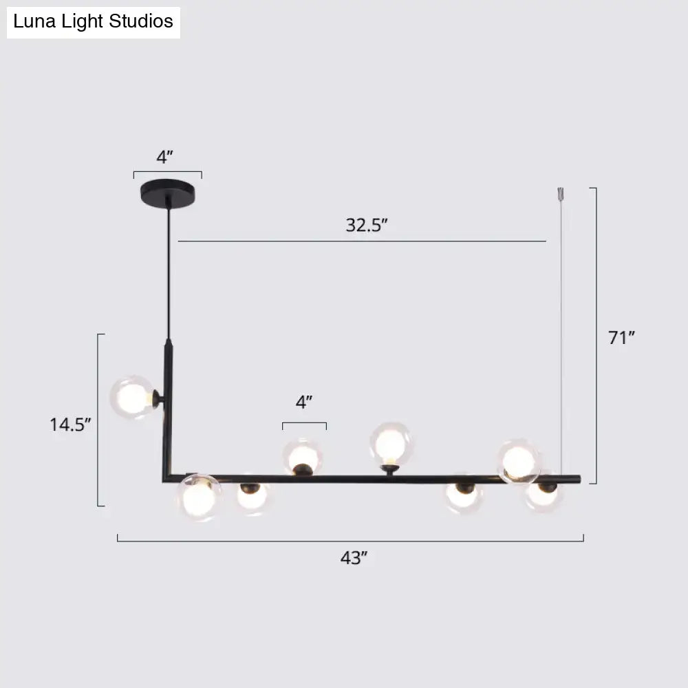 Decorbites sleek black metal pendant light with six clear glass globes for dining room hanging island design