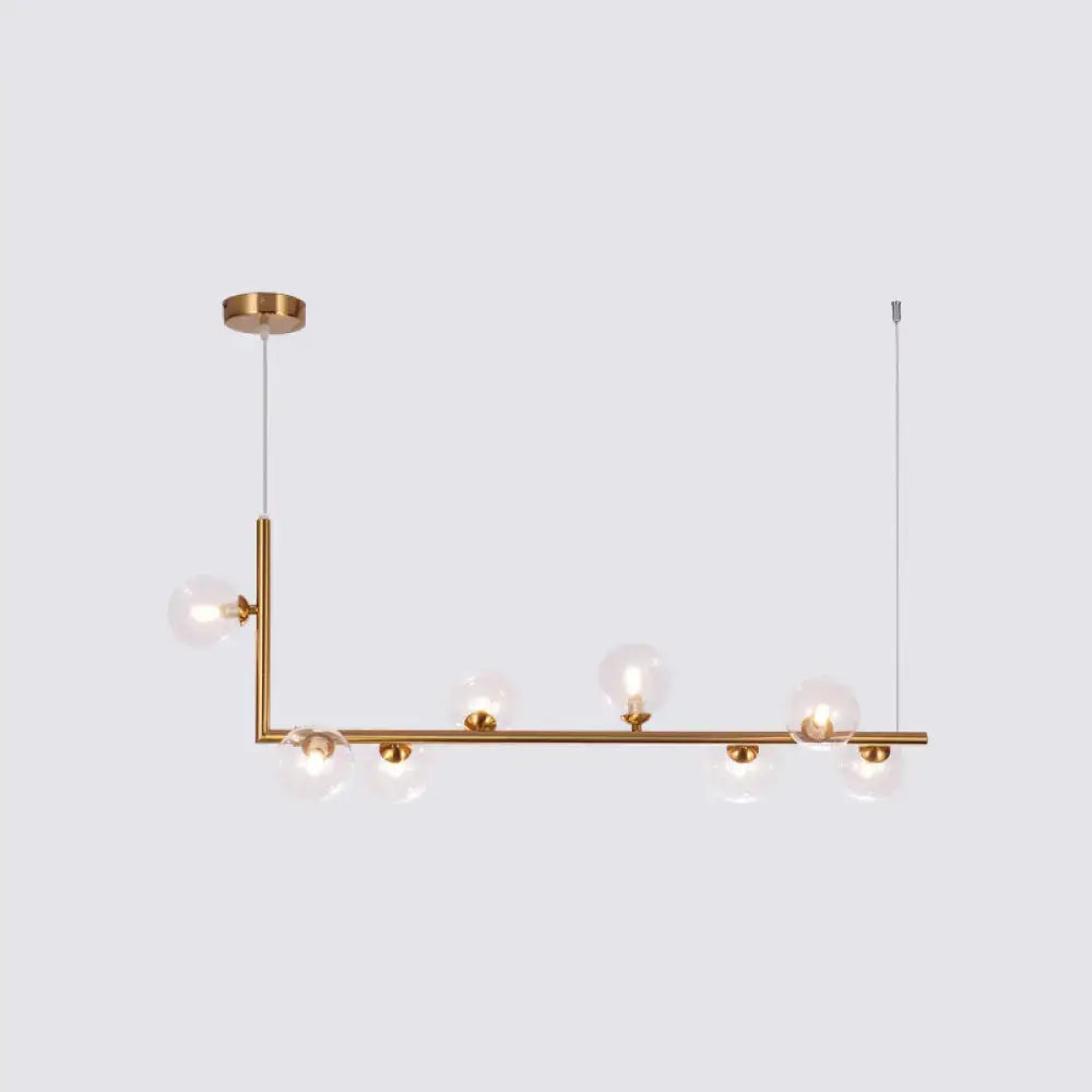 Modern brass pendant light with clear glass globe bulbs by decorbites for dining room hanging island use