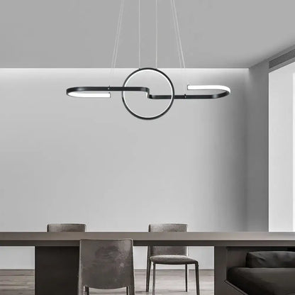 DecorBites™ sleek black metal pendant light with circular and curved LED elements for modern dining room use