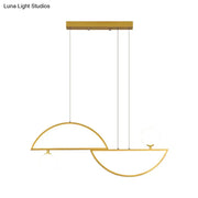 Modern gold-toned ceiling light with sleek semi-circular metal frames and frosted glass globe accents for dining room island light fixture