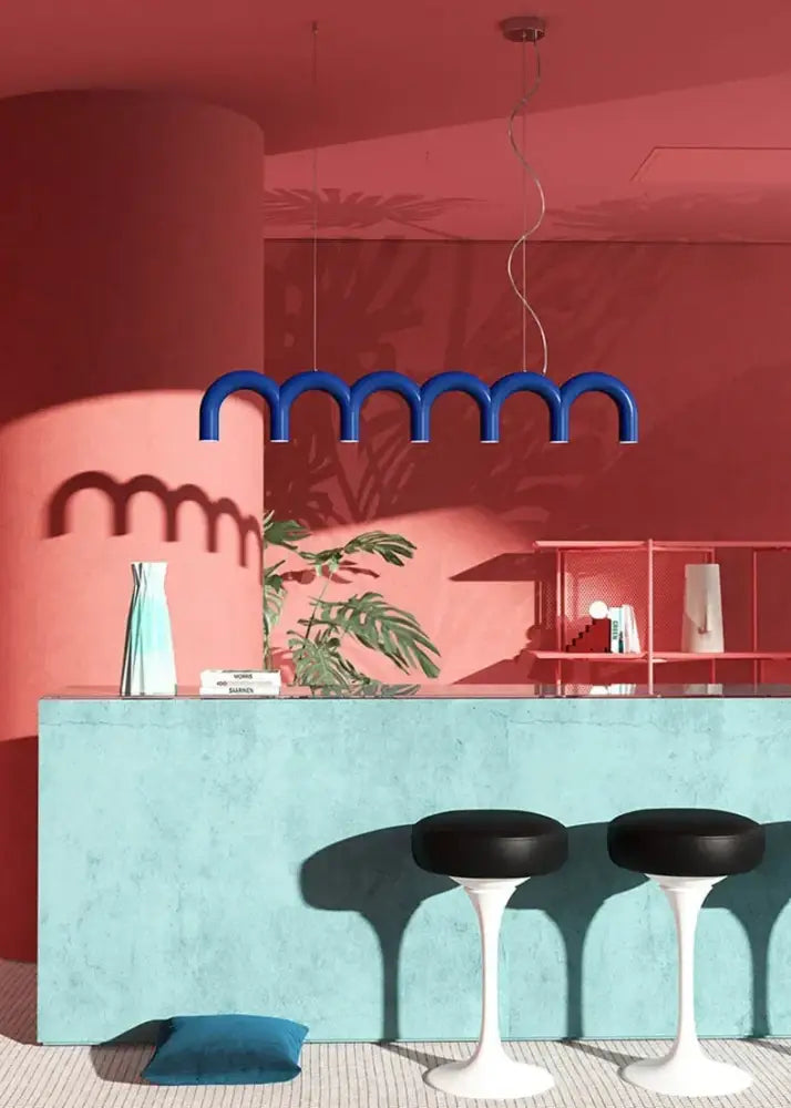 Decorbites sleek blue wavy modern u-shaped chandelier suspended above turquoise counter for bedroom and kitchen