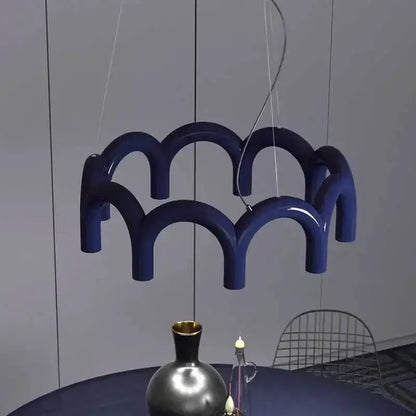 Deep blue glossy modern u-shaped chandelier by DecorBites with sculptural wave design for bedroom and kitchen