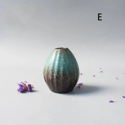 DecorBites™ small ceramic vase with glossy teal and earthy brown glaze featuring subtle ridges for elegant Japanese home decor