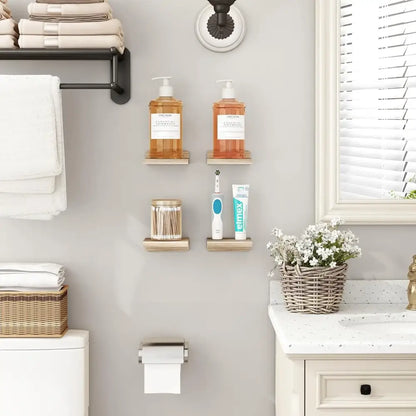 Two amber pump bottles with silver pumps on decorbites™ small wood floating shelves 4-pack small floating shelves