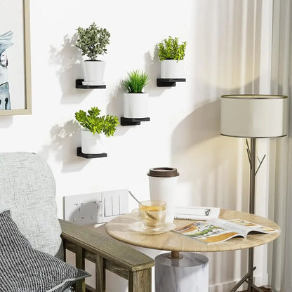 Decorbites™ small wood floating shelves 4-pack with black metal wall shelves holding white ceramic planters and plants