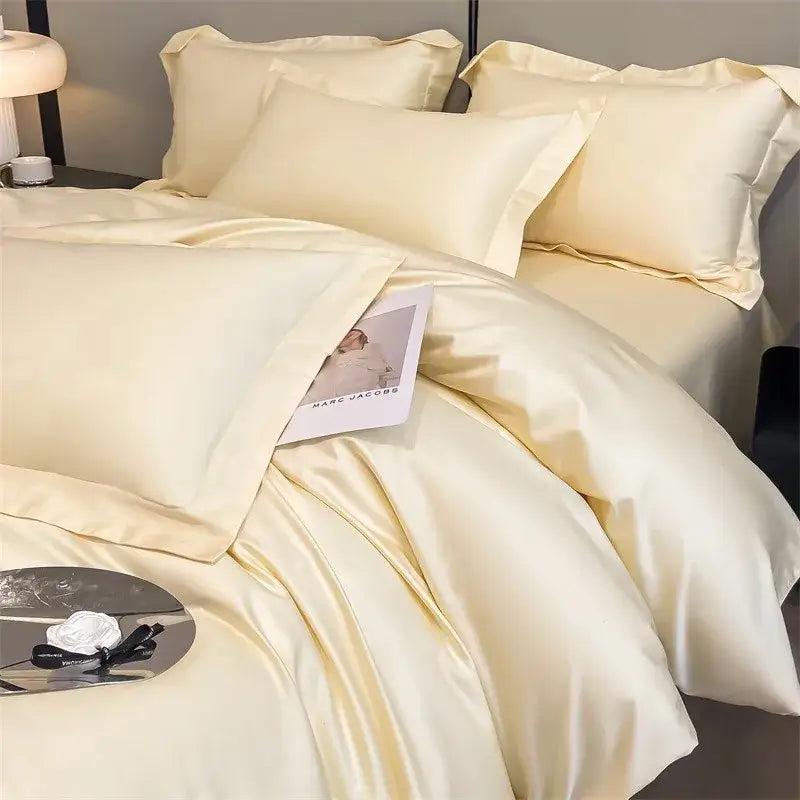 Cream-colored satin DecorBites™ soft Egyptian cotton bedding set with smooth glossy finish includes duvet cover and fitted sheet