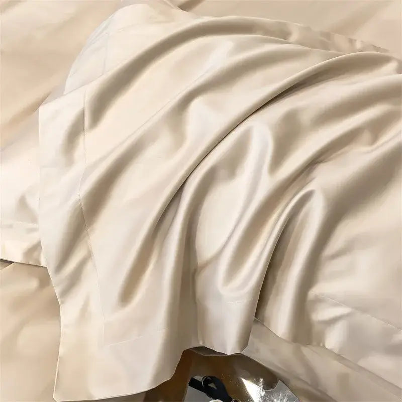Cream-colored satin pillowcase from decorbites soft egyptian cotton bedding set with a smooth glossy finish for fitted sheet use