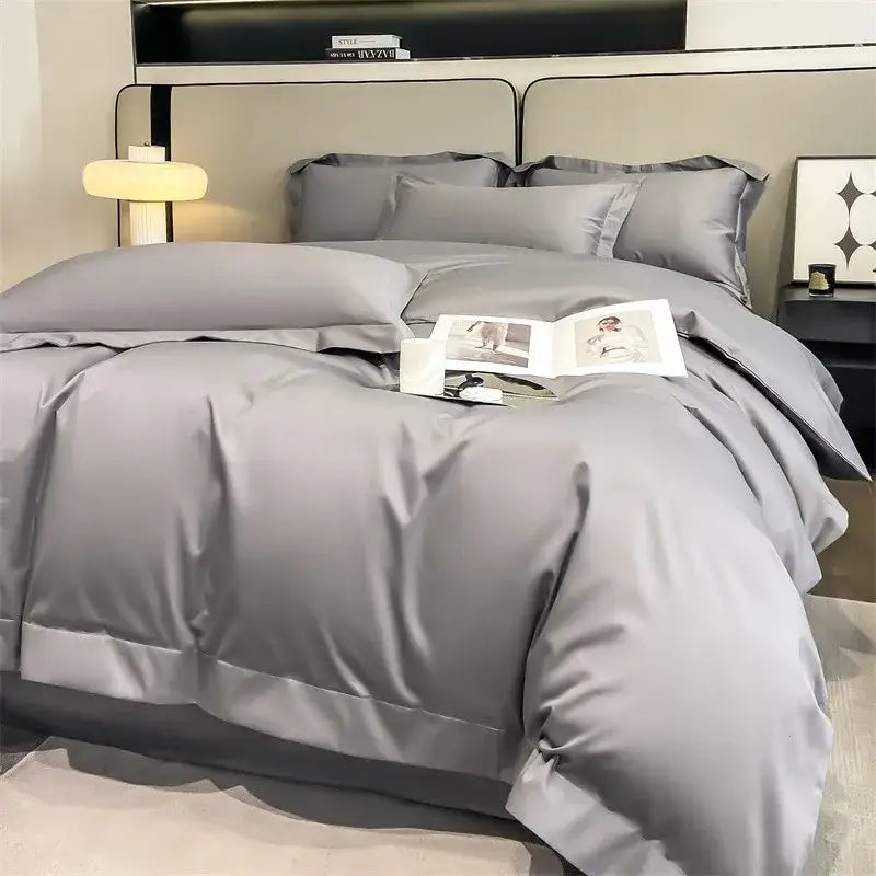 Gray satin DecorBites™ soft Egyptian cotton duvet cover set with matching pillows featuring stitched detailing and fitted sheet
