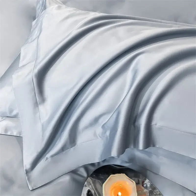 A soft light blue satin pillowcase from decorbites™ soft egyptian cotton bedding set 1000tc with smooth glossy finish