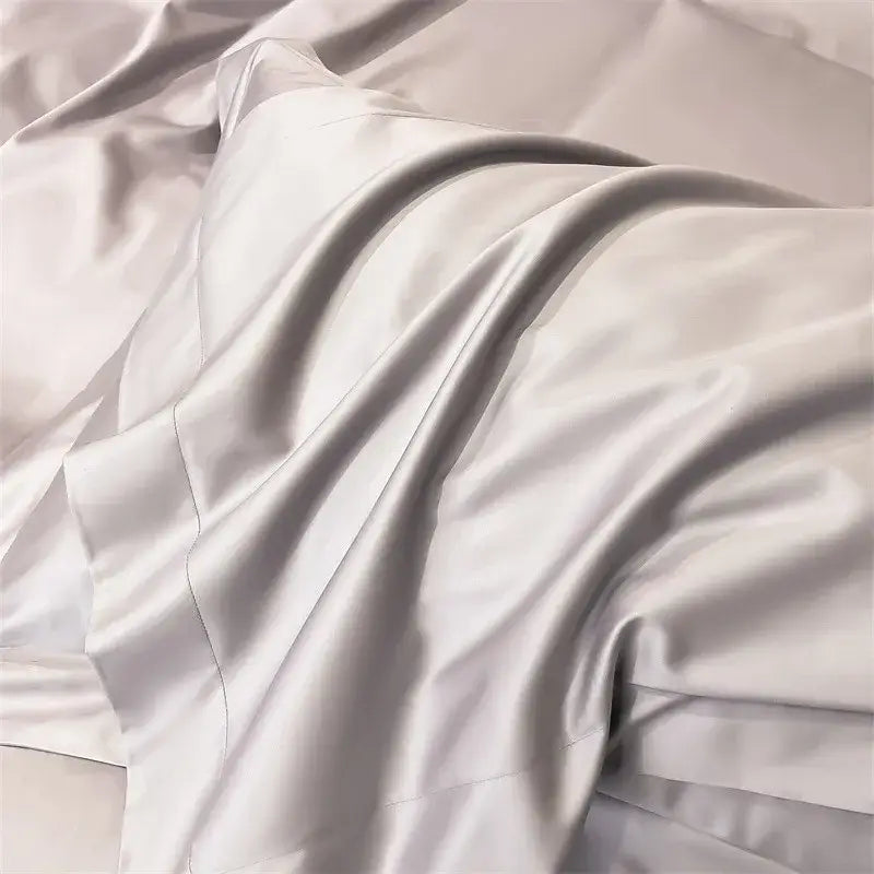Luxurious silver satin decorbites™ soft egyptian cotton fitted sheet with smooth glossy finish and elegant folds