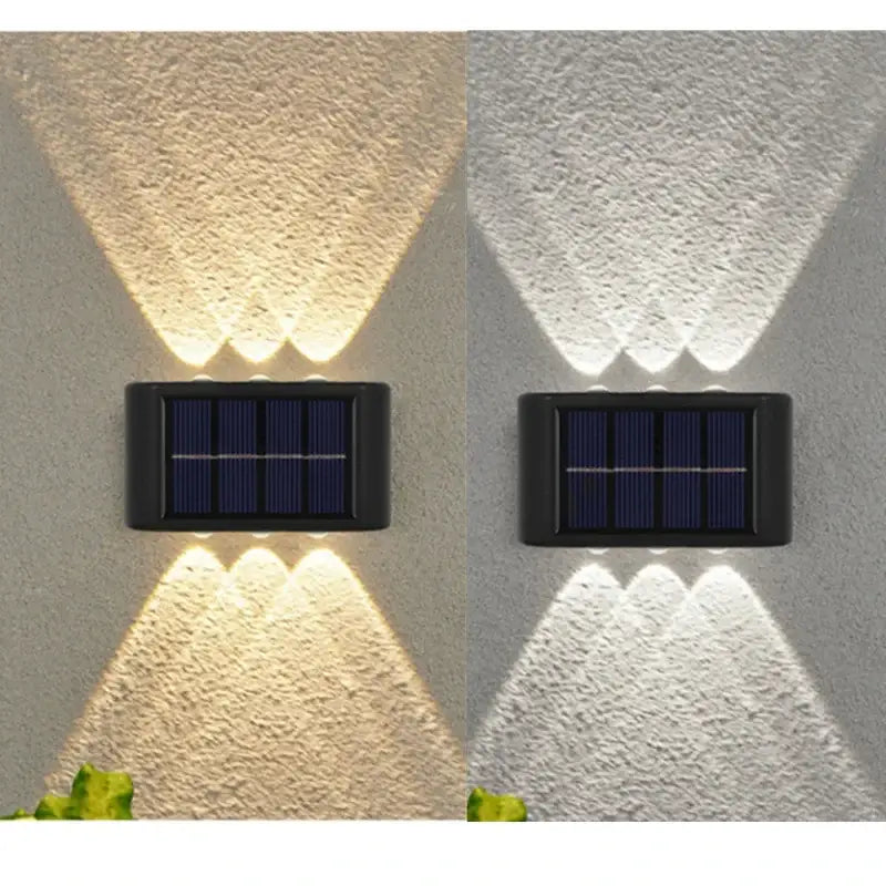 DecorBites™ solar LED outdoor wall light in black with three downward-facing lamp beads for efficient illumination