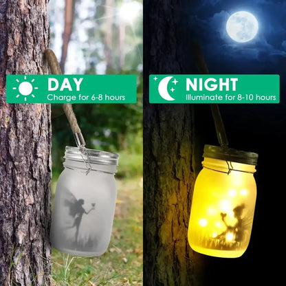 Decorbites™ solar mason jar with frosted glass and silver metal lid featuring glowing etched fairy silhouette for garden decor