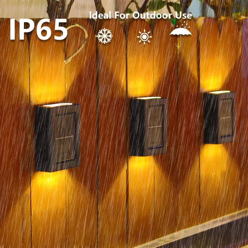 Decorbites™ solar outdoor led lights are black rectangular solar wall sconces with integrated panels and warm yellow lighting