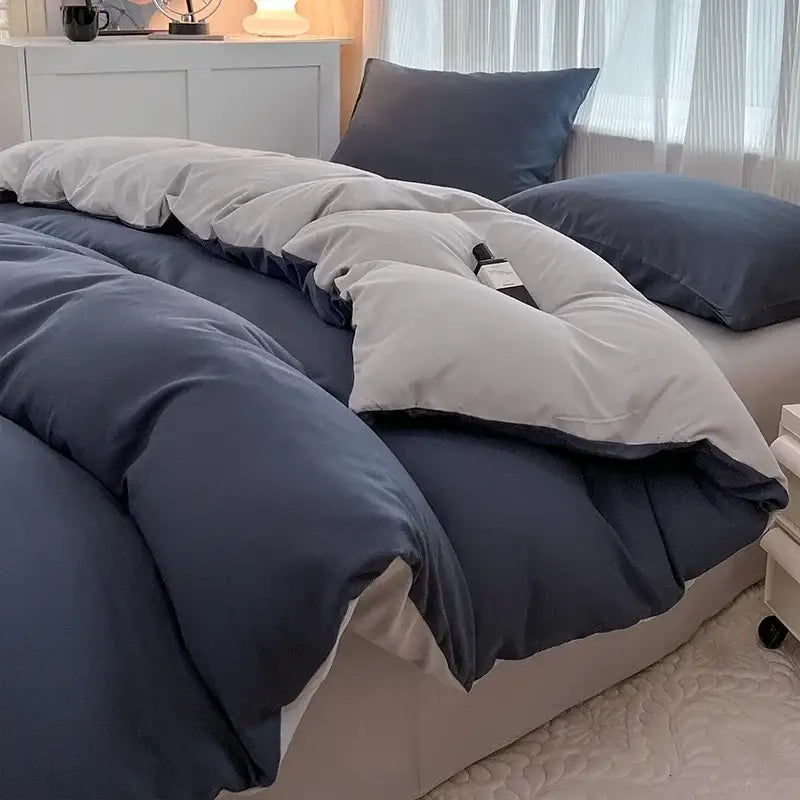 Navy and gray two-tone quilted duvet cover set in solid color brush fabric from DecorBites 4-piece bedding set