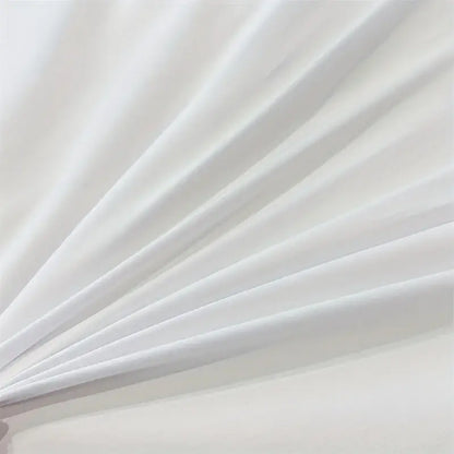 White smooth fabric with gentle folds and soft sheen in the decorbites™ solid color brushed duvet cover set