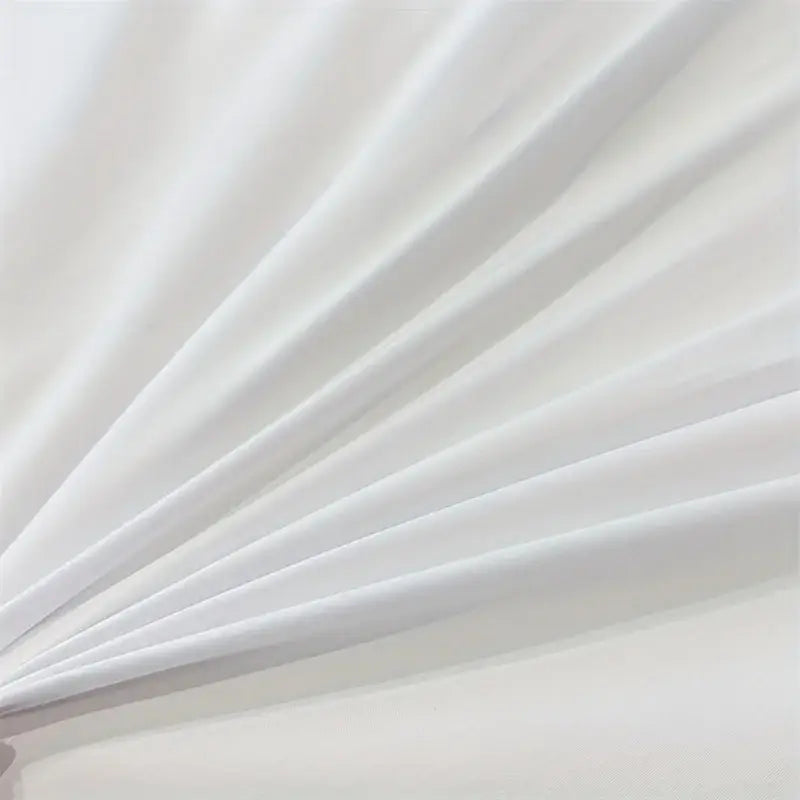 White smooth fabric with gentle folds and soft sheen in the decorbites™ solid color brushed duvet cover set