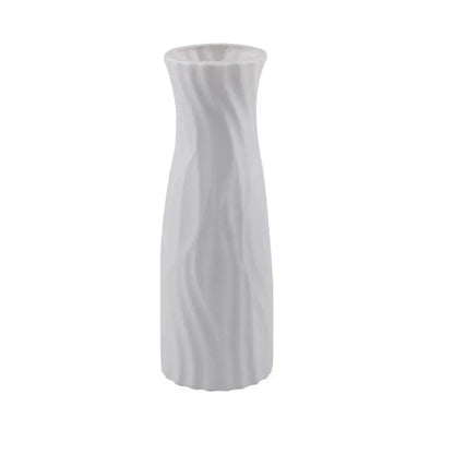A sleek white solid color plastic flower vase with a modern twisted design for home decor by decorbites