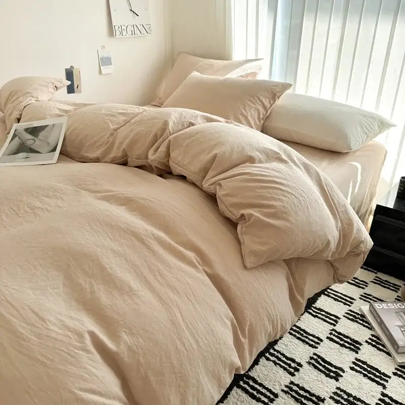 Beige solid cotton bedding set with duvet cover and matching pillows from DecorBites for a cozy bedroom
