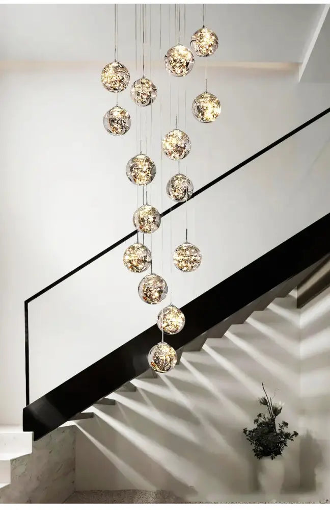 DecorBites™ spiral crystal ball chandelier light with spherical glass globes and textured metallic interiors reflecting warm light