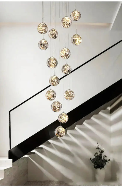 DecorBites™ spiral crystal ball chandelier light with spherical glass globes and textured metallic interiors reflecting warm light