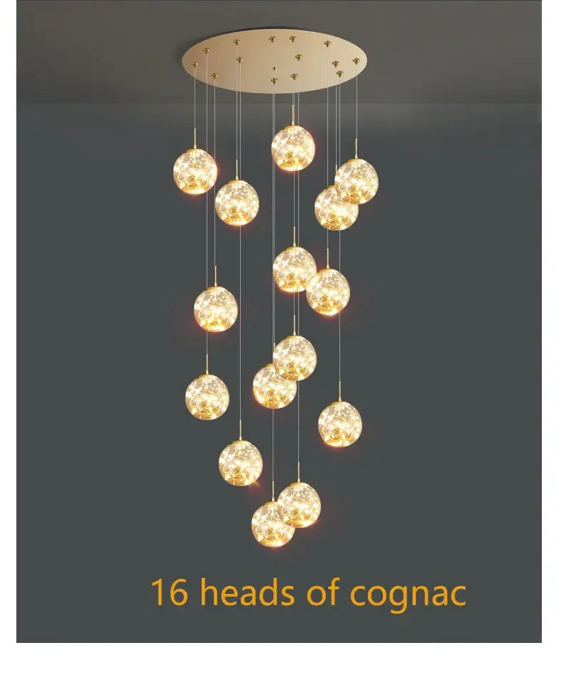 DecorBites™ crystal ball chandelier featuring 16 warm golden glass globes on a gold-toned spiral ceiling mount