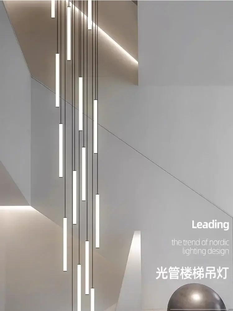 Modern minimalist DecorBites™ spiral led chandelier with slender illuminated tubes suspended by thin cables in white setting