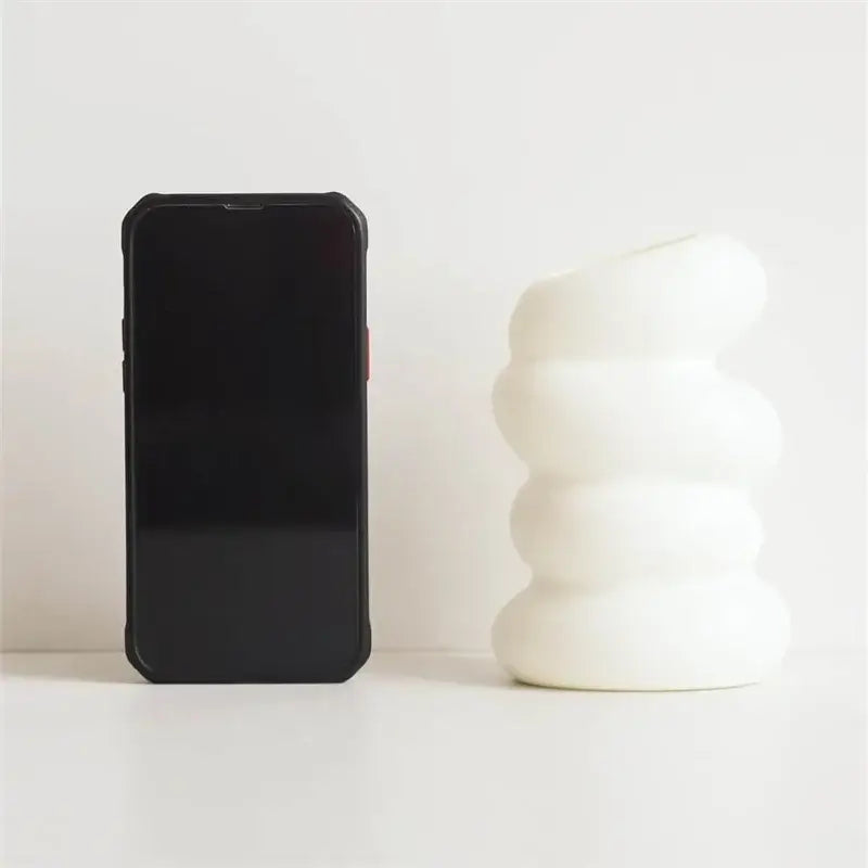 White ceramic spiral white vase with stacked rounded segments for home decoration by DecorBites™