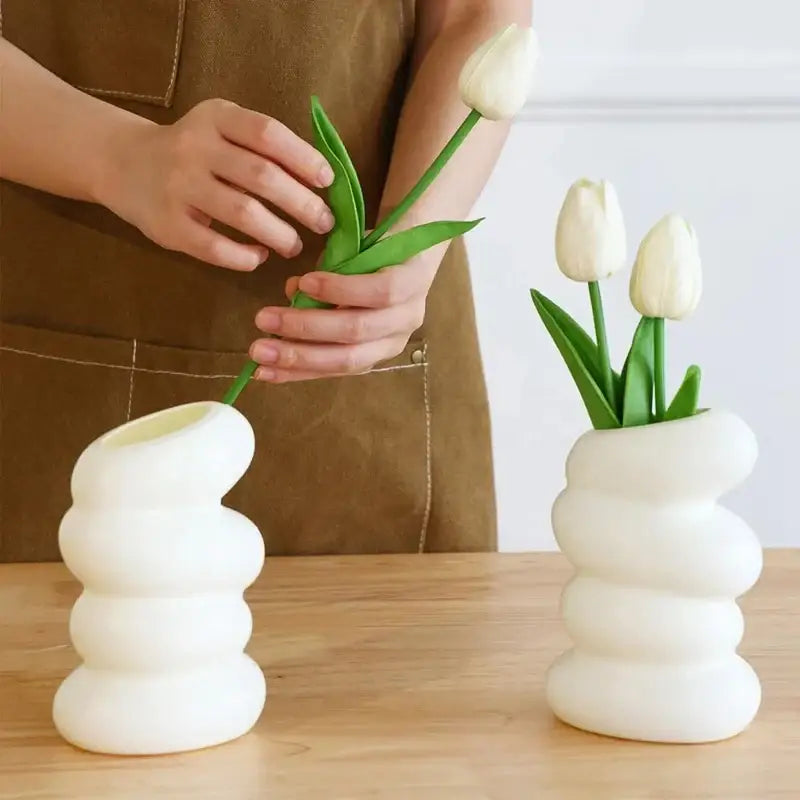 DecorBites™ spiral white vase made of glossy ceramic with a stacked rounded design for home decoration