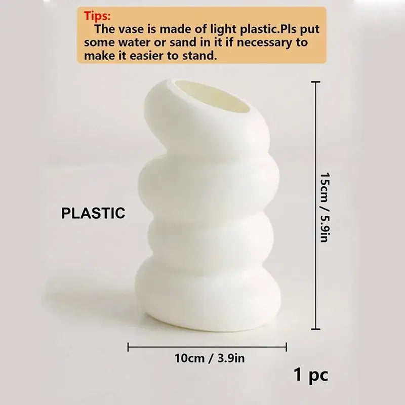 DecorBites™ spiral white vase with a unique wavy segmented design made of light plastic for home decoration